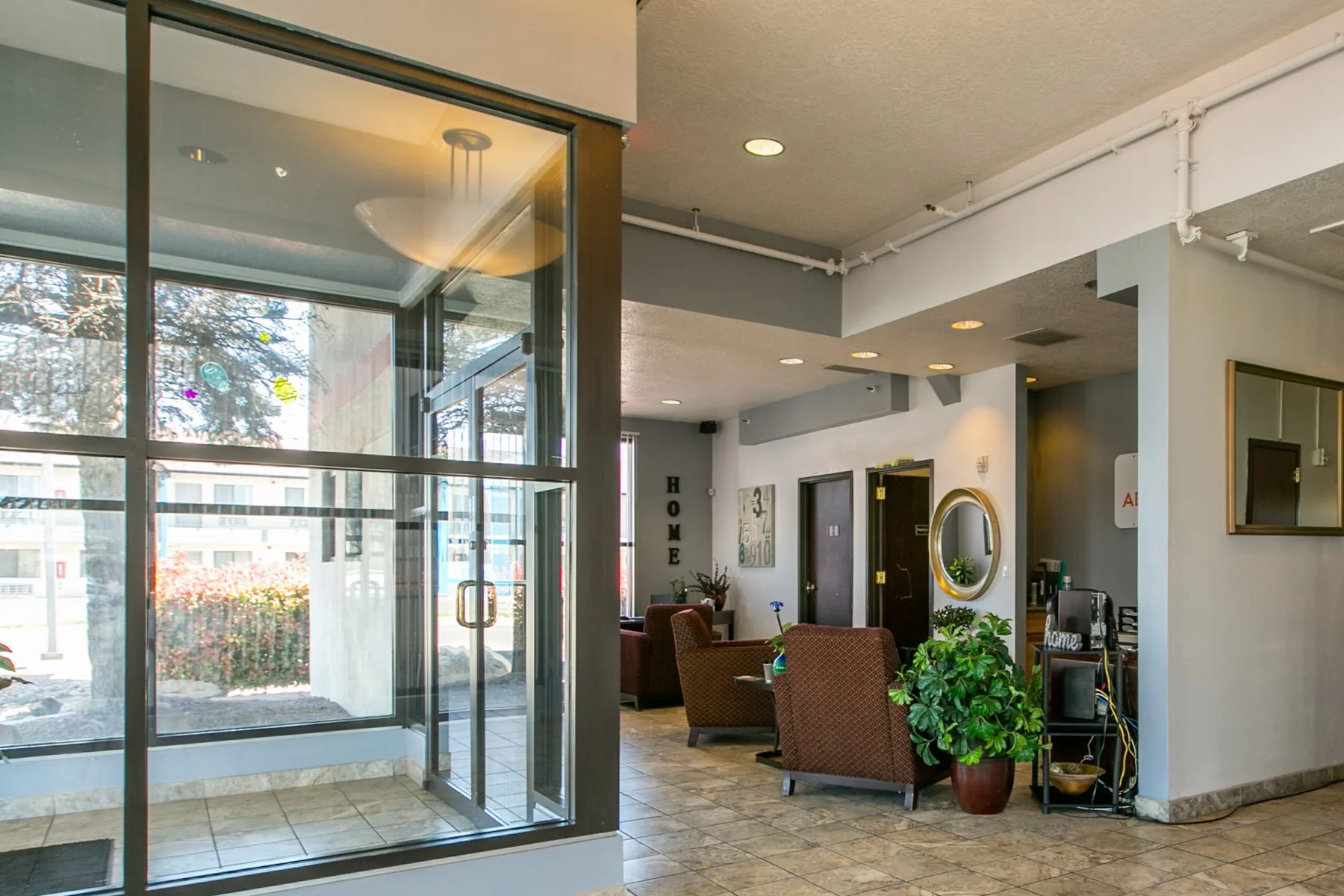 Glass entrance and lobby at ABQ Encore Apartments